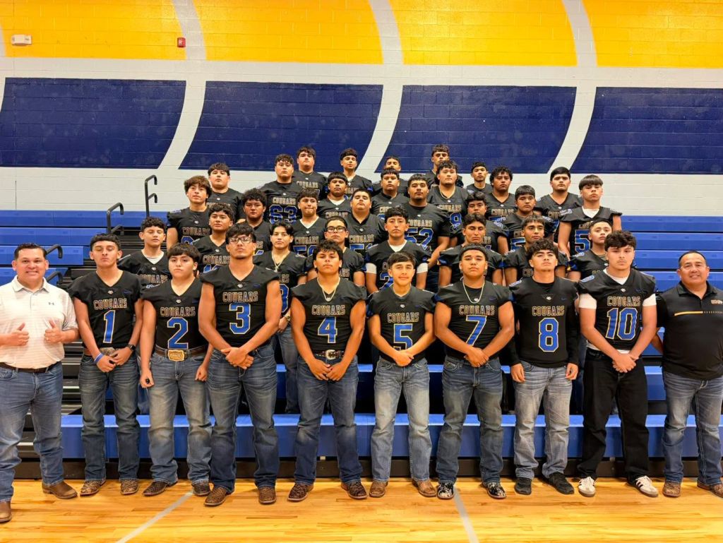 Commissioner Gus Ruiz stands with the 2026-2027 Santa Maria High School Football Team.