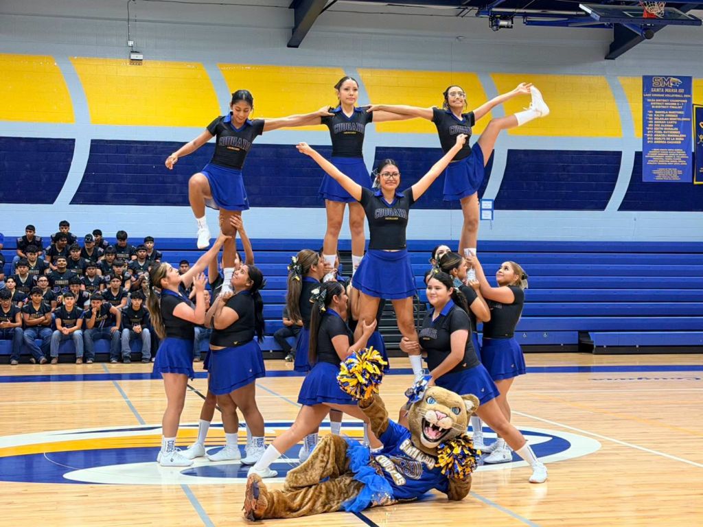 The Sante Maria High School Cheerleading Squad performs.